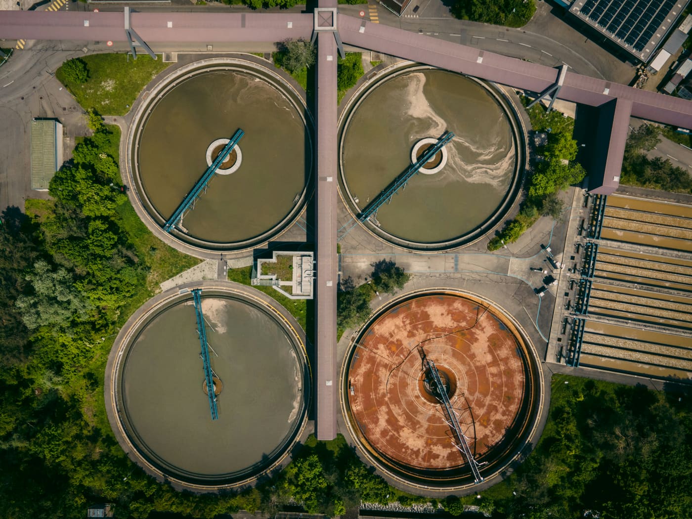round treatment tanks of a wastewater plant seen from above